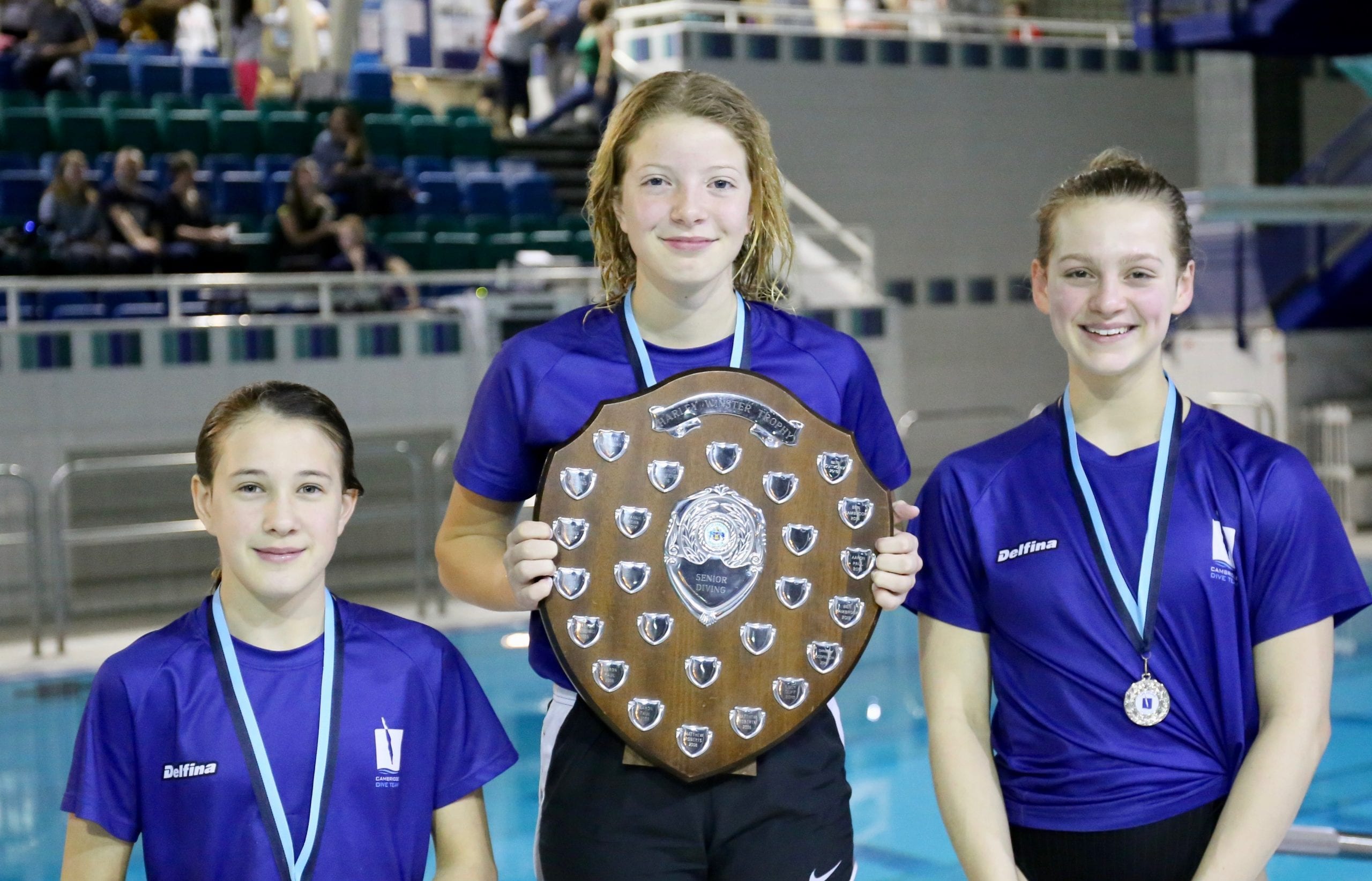 Three divers receiving awards